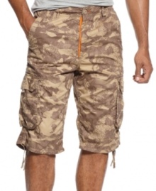 No reason to blend in. Show off your relaxed but put-together style with these camouflage cargo shorts from Sean John.