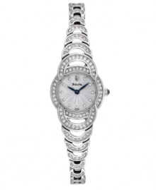 Sparkling circles link together on this glittering watch by Bulova. Stainless steel bracelet and round case embellished with crystal accents. Stamped silver tone dial features crystal dot markers, two royal blue hands and logo at twelve o'clock. Quartz movement. Water resistant to 30 meters. Three-year limited warranty.