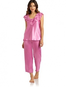 THE LOOKTiers of chiffon ruffles adorn the yoke and cap sleevesV-neck with center chiffon bowSatin bodySatin drawstring waist pajama pantsTHE FITTop: about 25 from shoulder to hemPants: rise, about 10; inseam, about 26THE MATERIALPolyesterCARE & ORIGINMachine washImported