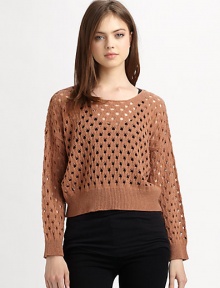 Downtown-cool sweater in a cropped, open-knit silhouette with ribbed trim and lots of swagger. RoundneckDropped shouldersLong dolman sleevesRibbed cuffs and hemAbout 20 from shoulder to hemAcrylicHand washImportedModel shown is 5'11 (178cm) wearing US size Small.