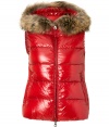 Sporty goes chic with this luxe fur-trimmed down vest from Duvetica - Fur-trimmed hood, dual-zipper front closure, zip pockets, quilted, slim fit - Wear with an oversized pullover leather leggings or skinny jeans, and ankle booties