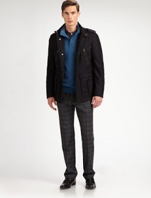 An outerwear essential for the approaching cold weather days, structured in a superior wool blend with a zip and button placket and front pockets for maximum versatility.Zip frontStand collarZippered chest, waist flap pocketsShoulder epaulettesFully linedAbout 30 from shoulder to hem80% virgin wool/20% polyamideDry cleanImported