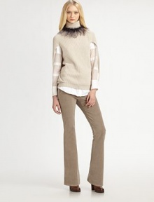 Plush rib-knit cashmere, in a sculptural pullover silhouette with unique split sides.TurtleneckSplit sides with attached back drapeAllover rib-knitCashmereDry cleanMade in Italy of imported fabricModel shown is 5'11 (180cm) wearing US size Small. 