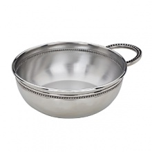 Elegantly designed with delicate beads, this Reed & Barton porringer has a rolled edge and a classic look that will stand the test of time. A wonderful way to honor the new arrival in your life.