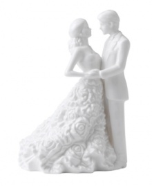 Something new for the stylish couple. A couture cake topper fashioned in white bone china offers a modern alternative to the traditional must-have. By Monique Lhuillier.