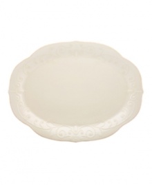 With fanciful beading and a feminine edge, this plater from the Lenox French Perle white dinnerware collection has an irresistibly old-fashioned sensibility. Hard-wearing stoneware is dishwasher safe and, in a soft white hue with antiqued trim, a graceful addition to every meal. Qualifies for Rebate