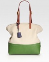 Stash your essentials in this colorblocked silhouette of pebble grain and matte leather.Adjustable double shoulder straps, 9¼-10½ dropTop zip closureTwo inside open pocketsCenter zip compartmentLinen lining11W X 13H X 5¼DMade in Italy