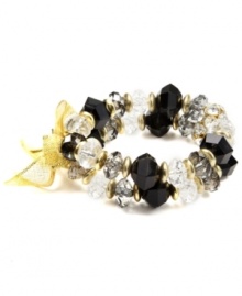 On the double. Two rows of fashionably faceted plastic beads adorn this stylish stretch bracelet from Jones New York. Made in gold tone mixed metal, the stretch design lets it slip on and off with ease. Item comes packaged in a signature gift box. Approximate diameter: 2-1/2 inches.