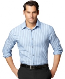 Go bold in blues. Standout style is effortless with this no-iron striped shirt from Van Heusen.