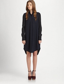 Tap into the minimalist mood with this relaxed wool-rich shirtdress, emboldened by a stand collar, oversized patch pocket and shirttail hem. Stand collarButton frontLong sleeves with buttoned cuffsSingle front patch pocketShirttail hem with back slitAbout 22 from natural waist96% wool/4% LycraDry cleanImportedModel shown is 5'7 (174cm) wearing US size 2.This style runs large. We recommend ordering one size down for a standard fit. 