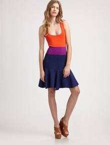 Flirty flared skirt and a vivacious colorblock design make this fitted scoopneck a day-to-night must-have. ScoopneckSleevelessContrasting waistbandFlared ruffle skirtAbout 21 from natural waist87% viscose/12% polyamide/1% elastaneDry cleanImportedModel shown is 5'9½ (176cm) wearing US size 4.