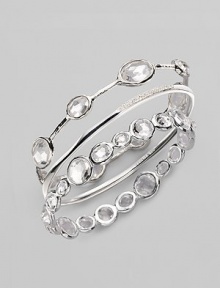 From the Paparazzi Collection. Ovals of faceted clear quartz shimmer within a bangle of polished sterling silver. Clear quartz Sterling silver Diameter, about 2¾ Imported Please note: Bracelets sold separately.