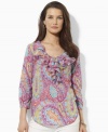 A beautifully bright paisley-pattern lends breezy charm to this Lauren by Ralph Lauren petite top, designed in light-as-air cotton voile with puffed sleeves and voluminous ruffles for a graceful touch. (Clearance)