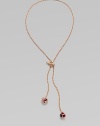 A warm rose goldtone style with colorful rhinestone accents on a delicate link chain. Rose goldtone brassGlass stonesLength, about 21½Pendant size, about ¾ Toggle closureImported 