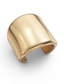 An antiqued gold cuff made from metallic resin, with a wide tapered form, exudes classic simplicity.Goldplated resin Width, about 2½ Diameter, about 2 Made in USA