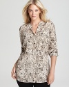 In a timeless snake print, Calvin Klein Plus's cool collarless shirt slips on for instant chic.