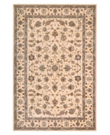 A flair for the different. This distinctive area rug features rich Persian and European designs, meticulously hand crafted of premium wool with elegant accents of silk to become a masterpiece of your home decor.