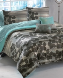 Fit for any jungle princess, Roxy's Huntress duvet cover set mixes tropical blooms and a smart plaid for a look that brings surf style home. Reverses to solid turquoise.