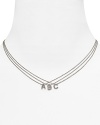 A glittering sterling silver initial pendant necklace from Crislu.