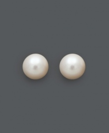 Polish your look with perfect, circular studs. These stunning stud earrings feature a AA cultured freshwater pearl set in a 14k gold post setting. Approximate diameter: 1/2 inch.