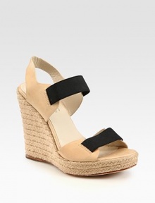 Comfy-chic espadrille wedge accompanied by soft leather straps and contrasting elastic trim. Braided hemp wedge, 4 (100mm)Braided hemp platform, 1 (25mm)Compares to a 3 heel (75mm)Elastic and leather upperLeather lining and solePadded insoleImported