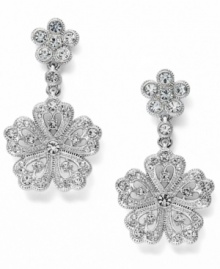 It's your time to shine. Elevate your special occasion style in Eliot Danori's intricate flower drop earrings. Crafted from silver tone mixed metal, earrings feature dozens of sparkling crystals. Approximate drop: 3/4 inch.