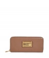 Stash away your most precious essentials in Marc by Marc Jacobs slim leather zip-around wallet, complete with an eye-catching logo plaque for a chic, covetable finish - Two inside sections with a zippered sectional coin pocket - Perfect for finishing sophisticated daytime looks