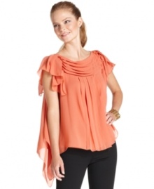 With plenty of pleats and a graceful asymmetrical drape, Studio M's latest blouse makes a feminine statement.