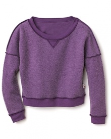 A fun, funky sweatshirt with an inside-out look. Reversed seams, a weathered heather body and v-neck inset give it that borrowed for big-sister look.