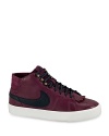 Looks meet performance in these retro-chic Nike sneakers, with a mid-rise silhouette and chic leather uppers.