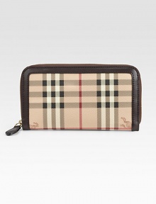 Iconic check design, trimmed and lined in supple leather, with a zip-around closure. Zipper closure Inside middle zipper pocket, 12 credit card slots, two bill slots Leather lining 7½W X 4H X 1D Imported Please note: Position of logo may vary.