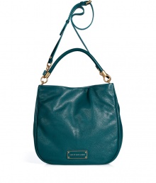 The classic hobo gets a modern redux with this supple leather version from Marc by Marc Jacobs - Classic hobo shape, magnet closure, top carrying handle, convertible shoulder strap, front logo plaque - Wear with an elevated jeans-and-tee ensemble or with a casual cocktail look