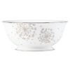 Wish come true. kate spade new york combines timeless platinum-banded bone china with shimmering mica dandelions in this irresistible serving bowl from the Dandy Lane dinnerware collection.