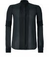 Recently relaunched with a fashion-forward aesthetic, Belstaff has infused this pleated blouse with luxe refinement - Stand-up collar, concealed front button placket with pleated panel, long sleeves with pleat detail, shirttail hemline - Style with leather leggings and platform pumps