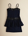 Light ruffles and tonal sequin trim lend a quiet elegance to Flowers by Zoe's tank-top dress.