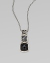 From the Chiclet Collection. A graduated design with cool hemitite, dark black onyx and dazzling diamonds in blackened sterling silver on a box link chain.Hemitite and black onyxDiamonds, .12 tcwBlackened sterling silverLength, about 17 to 18 adjustable Pendant size, about 1½Lobster clasp closureImported 