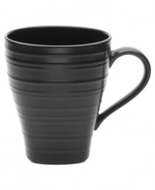 With the look of hand-thrown pottery in hard-wearing stoneware, the Swirl mug from Mikasa enhances casual meals with fuss-free elegance. A matte finish with glazed accents adds stylish distinction to sleek black.