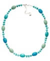 Stylishly Southwestern. Reconstituted turquoise beads adorn this eye-catching necklace from Lauren by Ralph Lauren. Whether you wear it to work or with more casual daytime outfits, it's sure to stand out as a chic complement. Crafted in mixed metal. Approximate length: 18 inches + 2-inch extender.