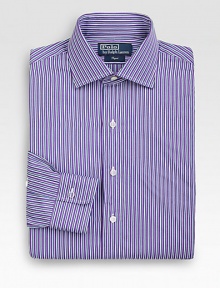 A trim-fitting look in crisp, two-ply cotton with preppy stripes for a refined look. Buttonfront Moderate spread collar Embroidered logo detail Cotton Machine wash Imported 