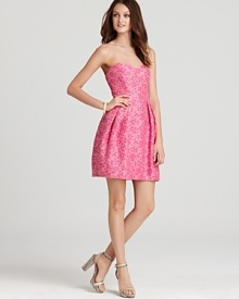 Packed with feminine details, this Shoshanna strapless dress makes a charming statement at every twirl.