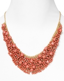 Brighten up every outfit with this layered beaded bib necklace from Cara accented by a dramatic collar of coral stones.