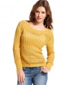 Layer on the cute! Open-knit style meets classic cable knit design on this boat neck sweater from Cotton Emporium.