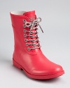 A shocking pink hue adds a bright spot to dreary days while climbing rope inspired laces feel right on-trend. From DKNY.