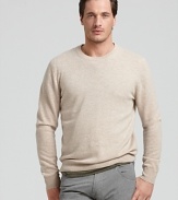 Luxurious cashmere and a classic silhouette make this cozy cashmere sweater this season's must-have item.