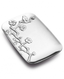 An artful interpretation of the cherry blossom, beautifully embossed in metal, adds springtime charm to any gathering. This radiant tray from Wilton Armetale is crafted in durable and rust-free aluminum alloy that resists chips and dents. Can be used in the oven or the freezer, so it's perfect for bringing straight to the table from the kitchen.