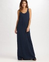 Simple yet elegant, this breezy maxi silhouette is finished with a dropped box pleat at the back for a unique, feminine touch.Scoopneck Wide straps Racerback Back box pleat About 45 from natural waist Tencel Dry clean Imported