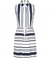 Nautical style goes mod with this adorable shirt dress from Raoul - Small spread collar, front button placket, sleeveless, tie detail at waist, pleated skirt - Wear with a breezy cardigan, wedge espadrilles, a vibrant tote