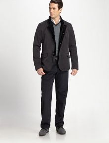 Lightweight outerwear essential, perfect when layering this season and beyond, finished with both a zip and button front finished in a smooth, resilient exterior.Zip-frontSnap-button placketChest welt, waist flap pocketsAbout 31 from shoulder to hemFully lined70% microfiber/30% nylonDry cleanImported