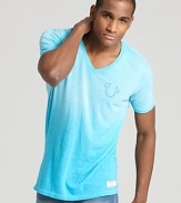 This fashionably faded tee sports True Religion's signature horseshoe print at the chest.