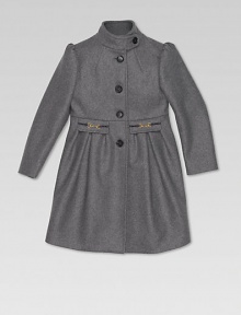 A beautiful, button-front felt coat with horsebit detail, front pockets and GG lining.Stand up collarLong sleevesButton-frontFlap pockets with metal horsebit and pleatsBack button panel70% wool/20% polyamide/10% cashmereDry cleanMade in Italy Please note: Number of buttons may vary depending on size ordered. 